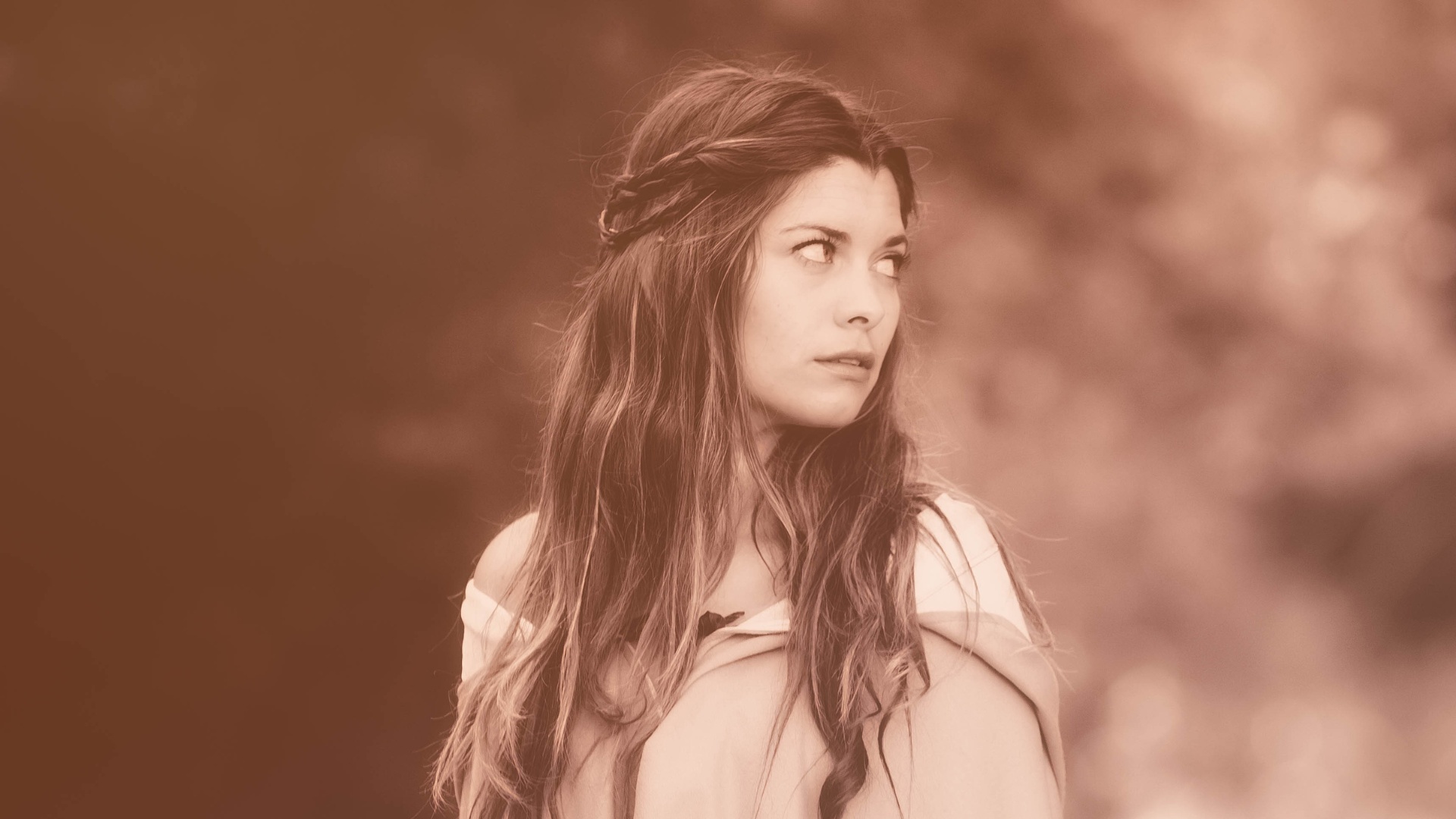 Woman pausing in quiet reflection, recognising the difference between passive hope and taking action